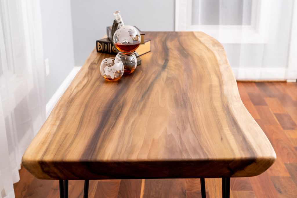 finished wood slab table on display in house