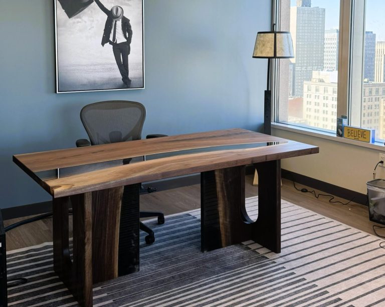 Black walnut and epoxy desk by Makers Woodshop