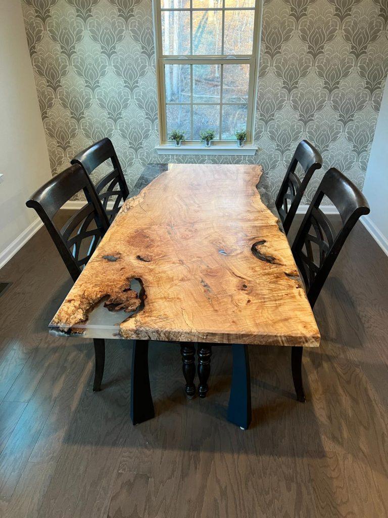 Live edge maple dining table with silver grey epoxy by Makers Woodshop